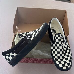 Vans Black and White Checkerboard Slip-Ons